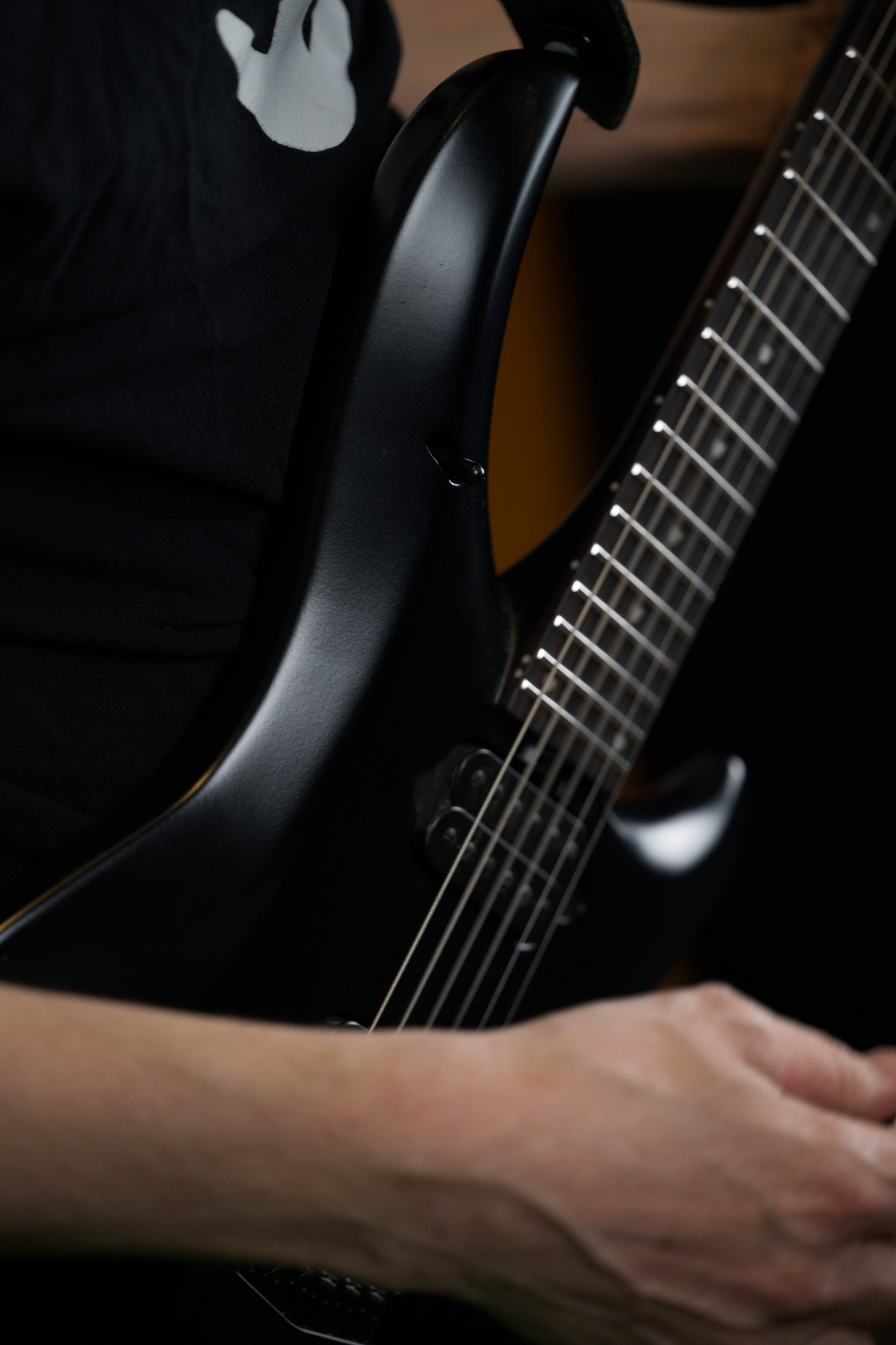 Electric guitar closeup for choosing a beginner practice amp with usable volume
